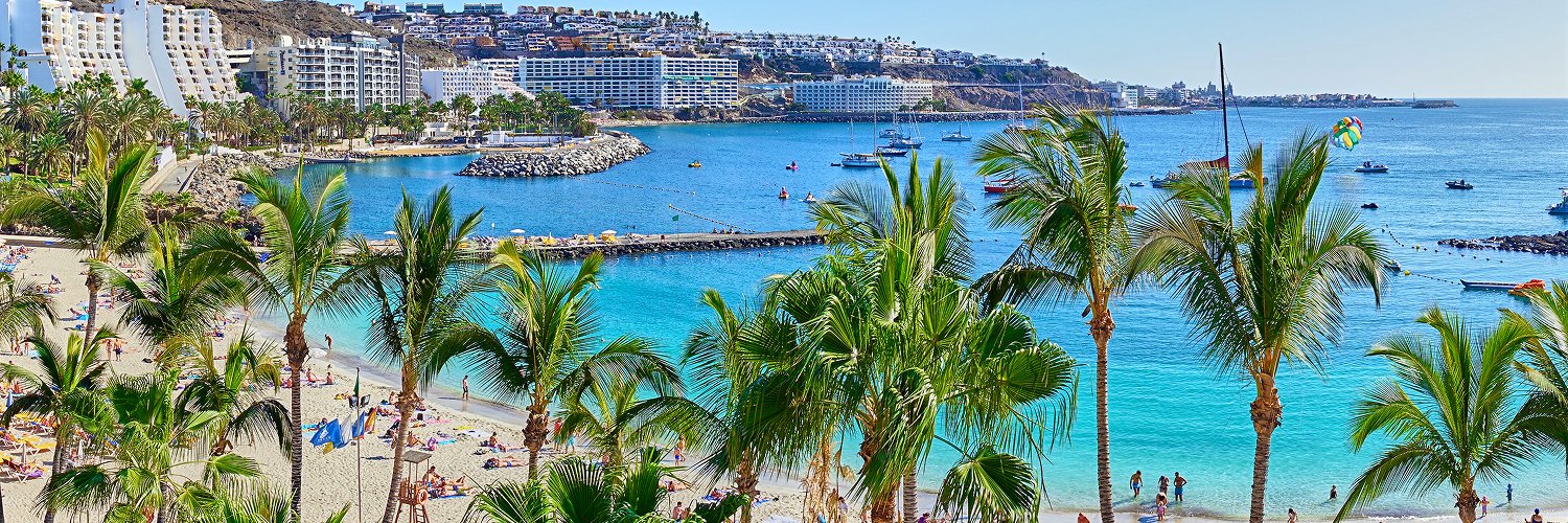 Gran Canaria en bungalow: piscina, palmeras y playa a pocos pasos
